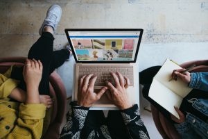 A freelance business person on a computer developing a plan